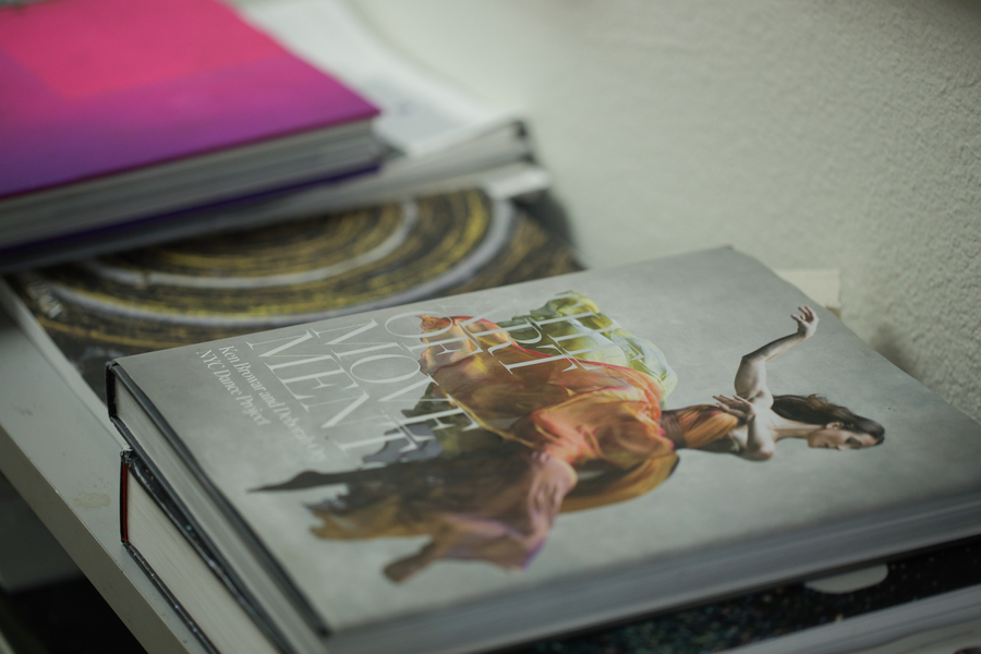 stack of magazines and books