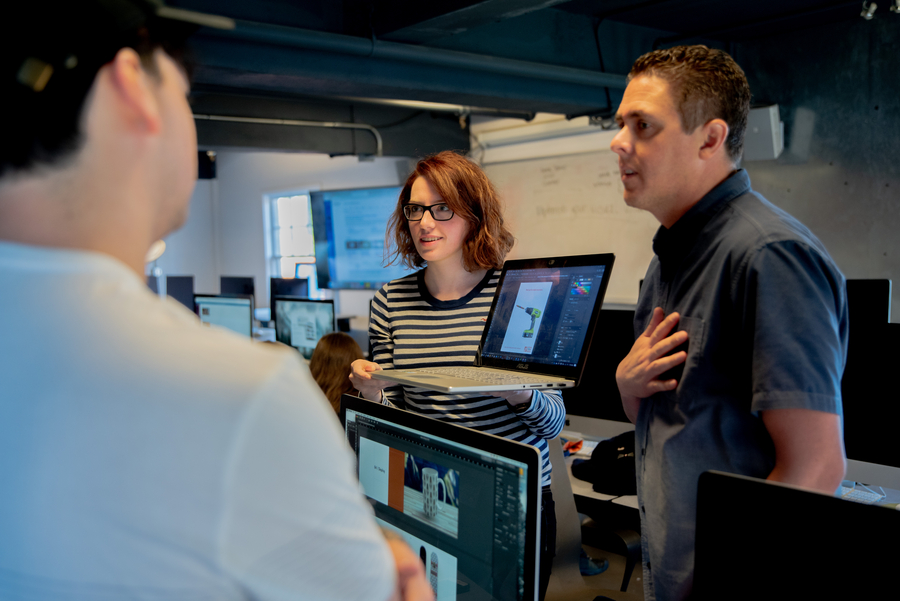 faculty talking to students