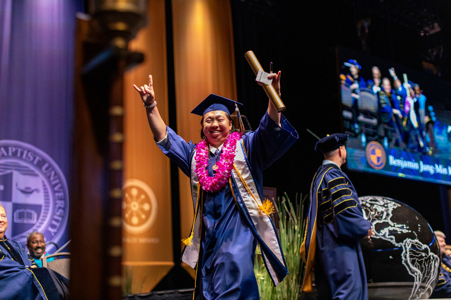 CBU graduate on stage