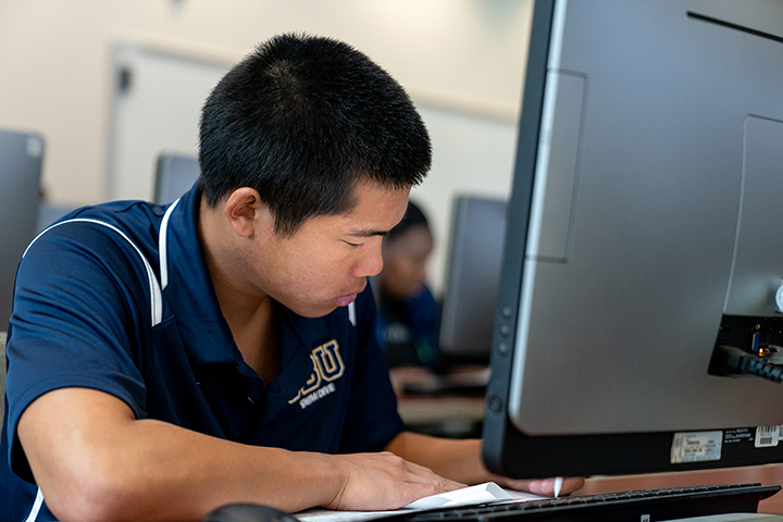 student at a computer