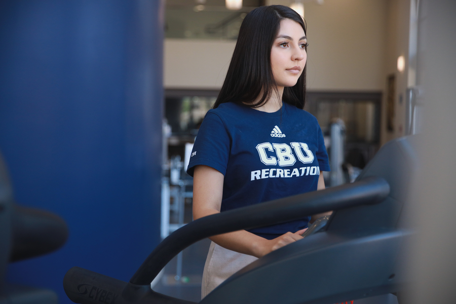 student using treadmill