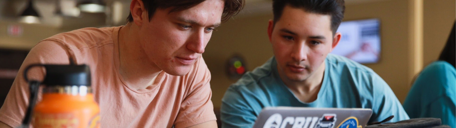 Students working on a laptop