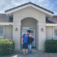 Photo of Angela at her new house