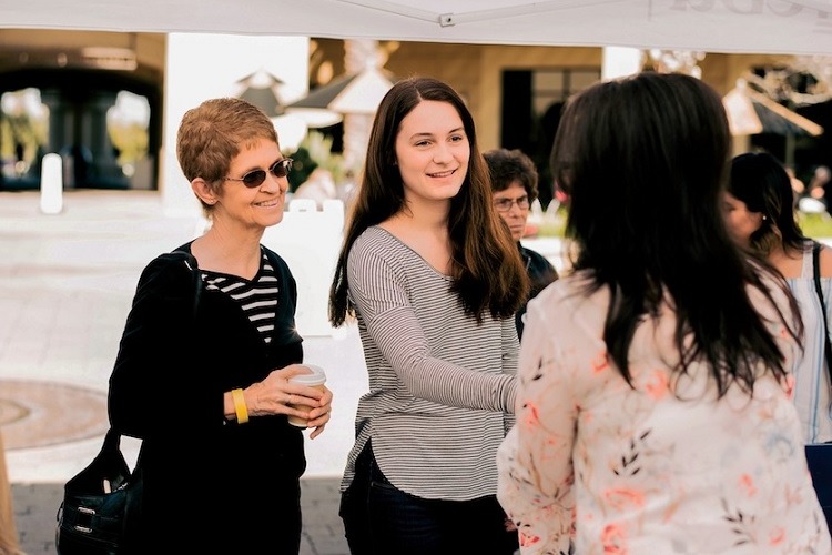 Grandparent and Student arriving at check-in